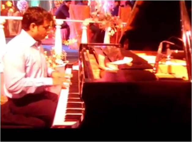male piano player kolhapur